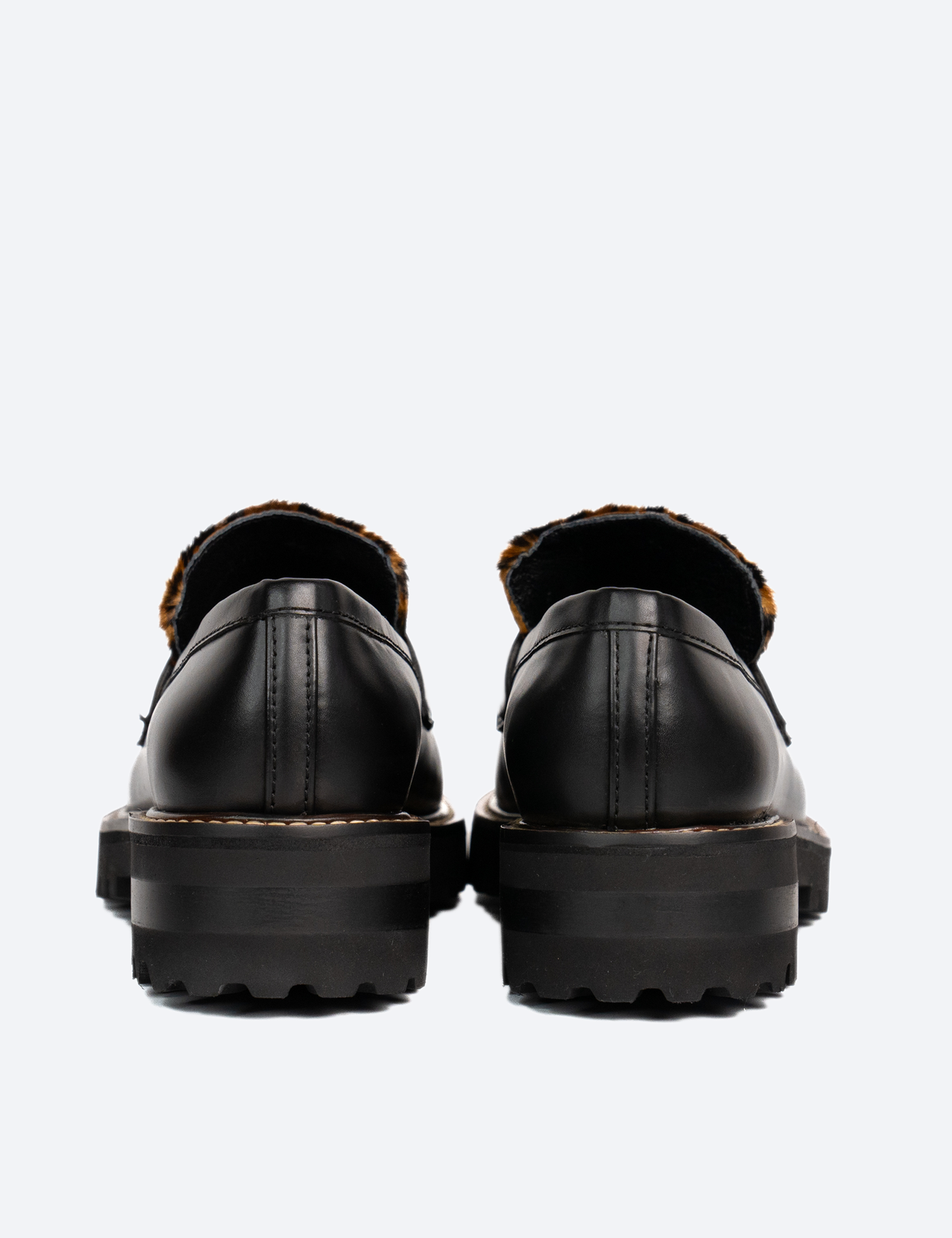 MOCASINES DONATO NEGRO CON ANIMAL PRINT